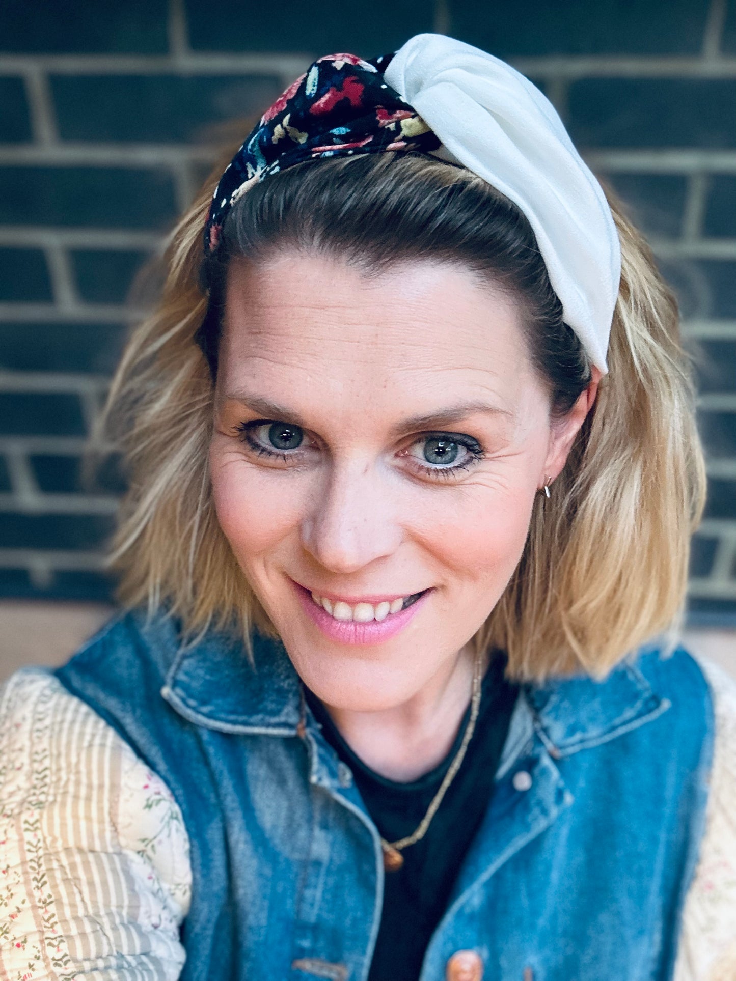 Black, burnt orange and red, and blue floral turban-twist with cream linen