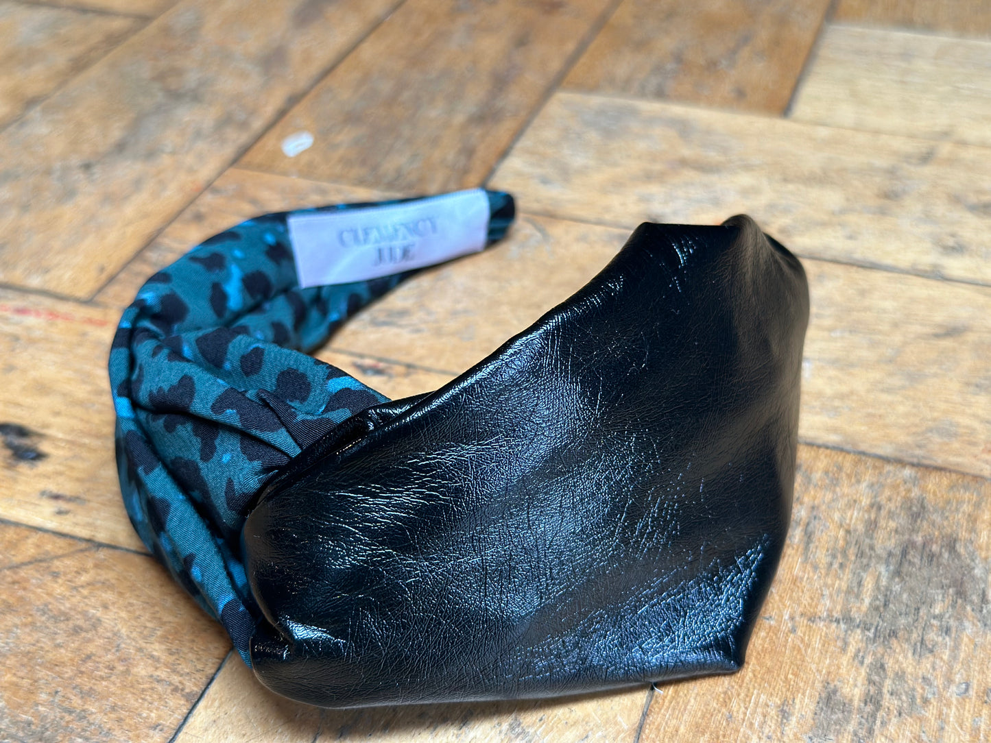 Black faux leather turban-twist mixed with green leopard print